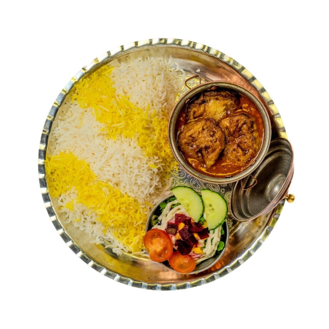 Gheymeh Bademjan - Lean diced lamb with yellow peas and caramelized onions, cooked in tomato sauce, topped with sautéed eggplants and served with saffron rice and salad.